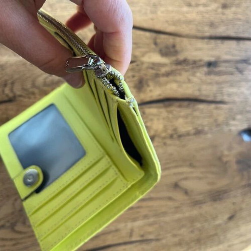 Axel wallet used in bright lime color