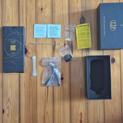 AirVape Legacy Pro 2 vaporizer like new with wireless charging and capsules
