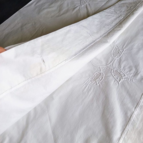 Vintage white cotton pillowcases pair with embroidery used