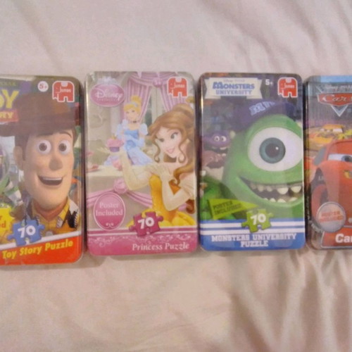 Disney puzzles new, pack of 4 with 70 pieces each
