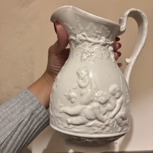 Embossed pitcher used