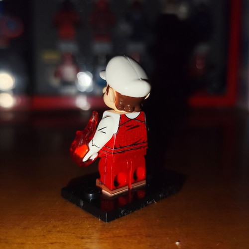 Fire Mario minifigure with orange fire and stand