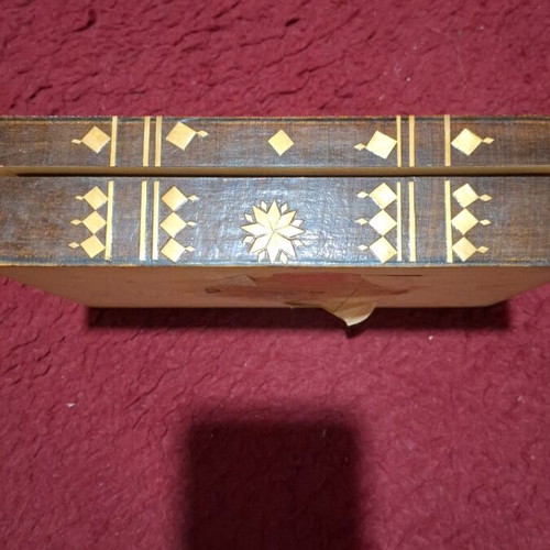 Handmade wooden jewelry box used with Ukrainian folk art
