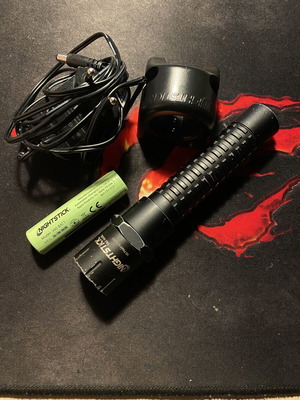 Nightstick TAC-560XL tactical flashlight like new with rechargeable battery and charger