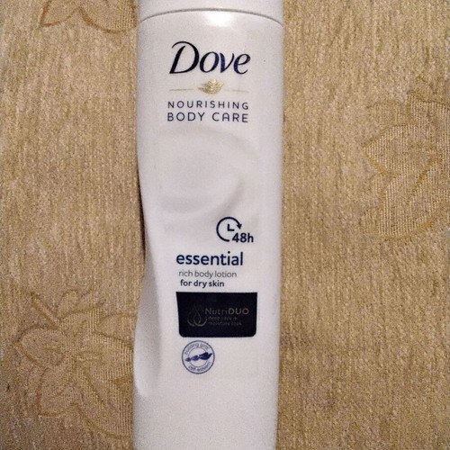 Dove Nourishing Body Lotion new, closed packaging