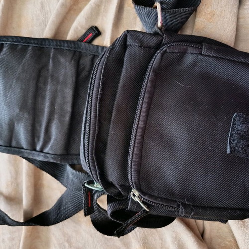 Men's bag like new, black with multiple compartments