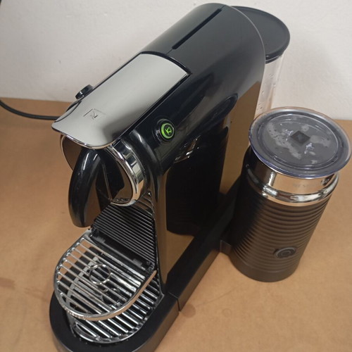 Delonghi Nespresso coffee machine with milk frother