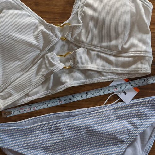 Bikini new, white top with gold heart details and baby blue bottom XS