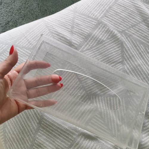 Plastic tissue box used, slightly cracked