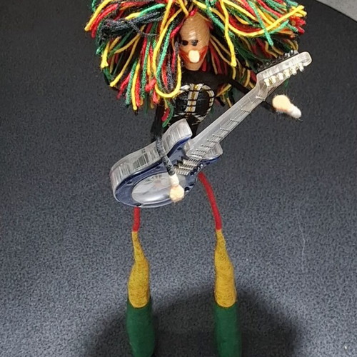 Vintage Table Clock Rastaman Figurine with Guitar like new