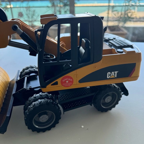Bruder CAT Excavator used with wheels and shovel