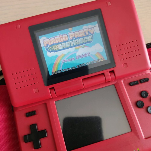 Nintendo DS (2004) console used with 2 games, charger, and accessories
