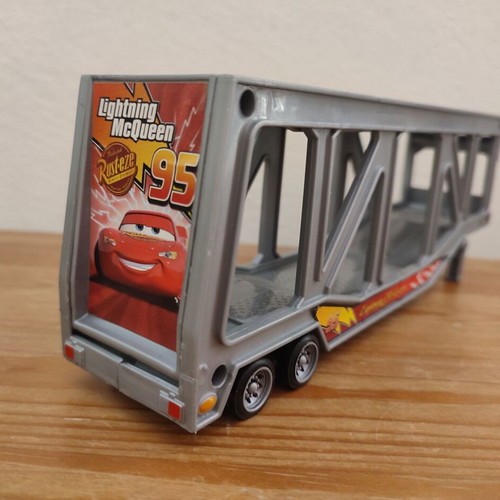 Toy Trucks pack of 3 used, including Cars-themed red truck
