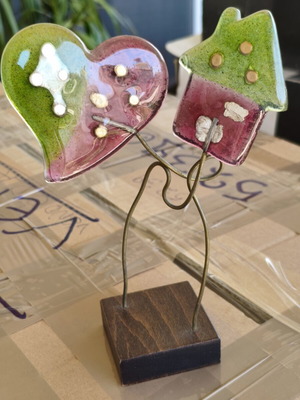 Decorative blown glass house with heart used, pink and green