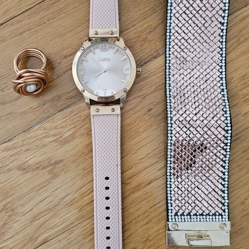 Oxette quartz watch used with bracelet and pink gold ring