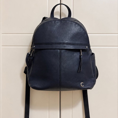Caprisa blue backpack used with visible wear