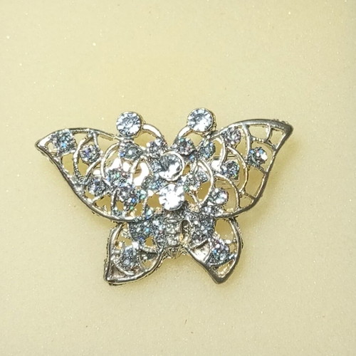 Metal brooch with semi-precious stones like new