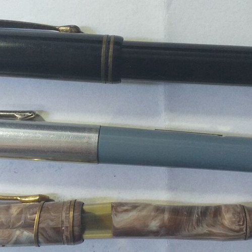 Set of 3 collectible pens with gold plating and slightly deformed body