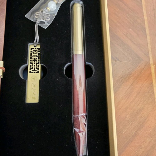 Zhejiang University collectible memorabilia set new with pen, flash drive, and notebook