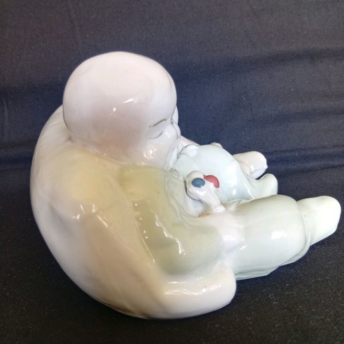 Porcelain figurine of twin babies like new