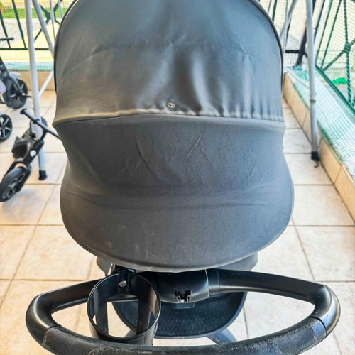 Stokke Xplory X Rich Black stroller used with gift bag set, changing mat, pouch