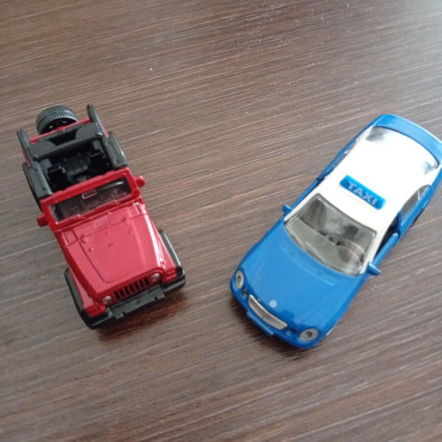 Siku toy cars used, set of 2 including taxi and Jeep Wrangler