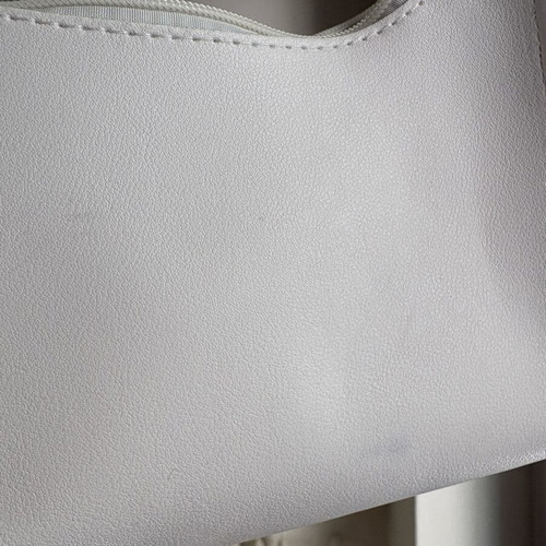Shein white shoulder bag used with small stain