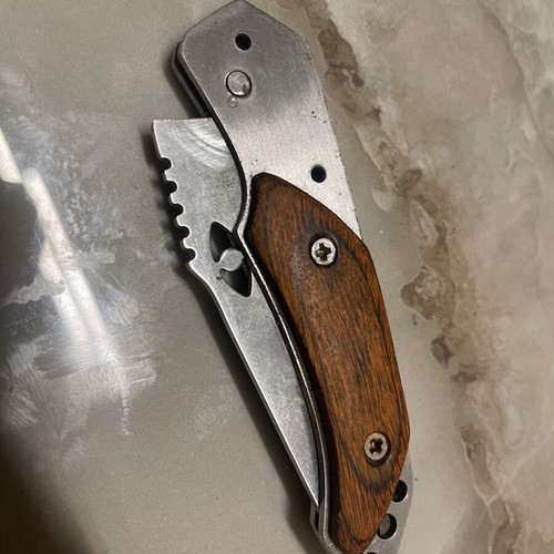 Folding Pocket Knife used, stainless steel blade with wooden handle