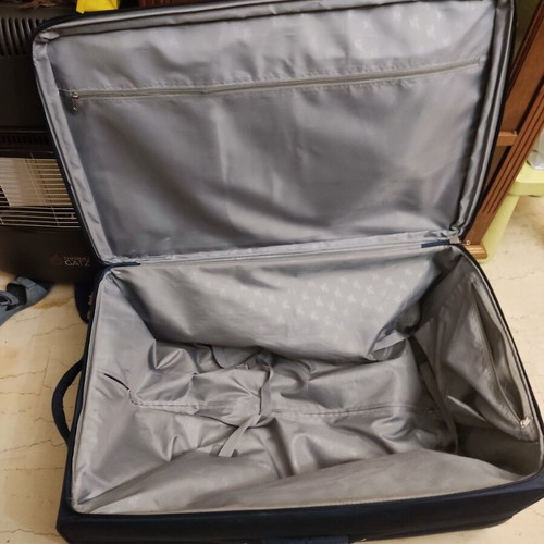 Large suitcase like new, blue with wheels