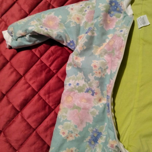 Baby sleeping bag or full-body romper with zipper and floral pattern like new