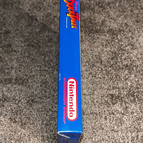 Nintendo NES DuckTales game like new with cartridge, box, and manual