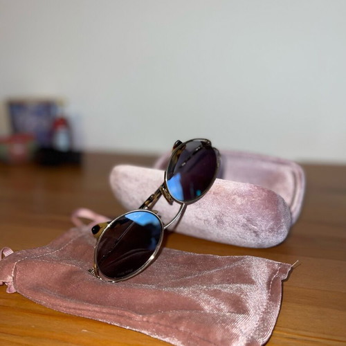 Miu Miu 52YS sunglasses like new, gold color