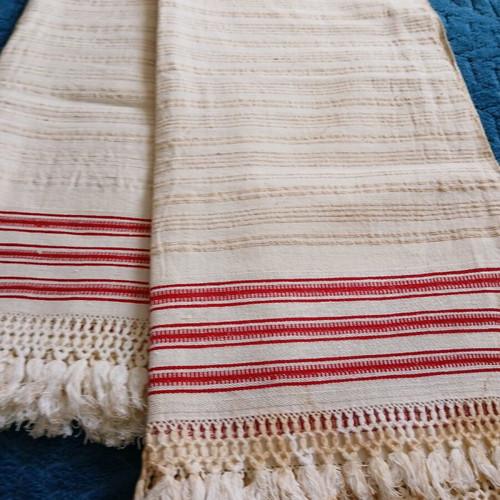 Woven tablecloth like new with hand-tied fringes