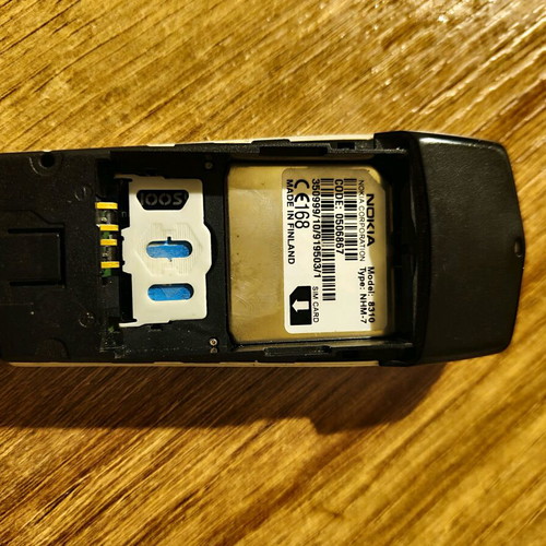 Nokia 8310 mobile phone with charger and battery