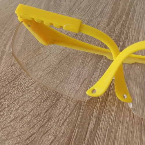 Hilka safety glasses used with adjustment and cord holes