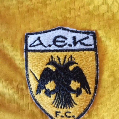 AEK kids football jersey #10 Tsartas, size 8Y