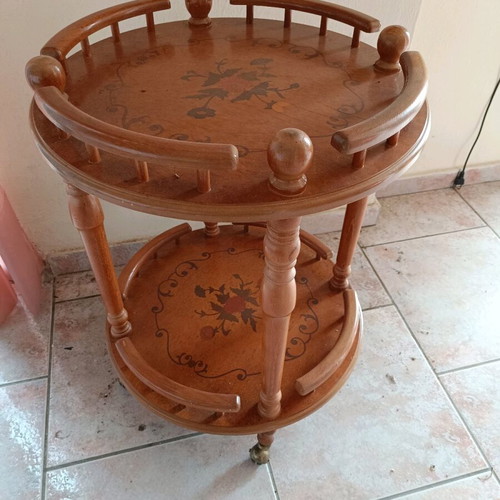 Round coffee table new with wheels and marquetry