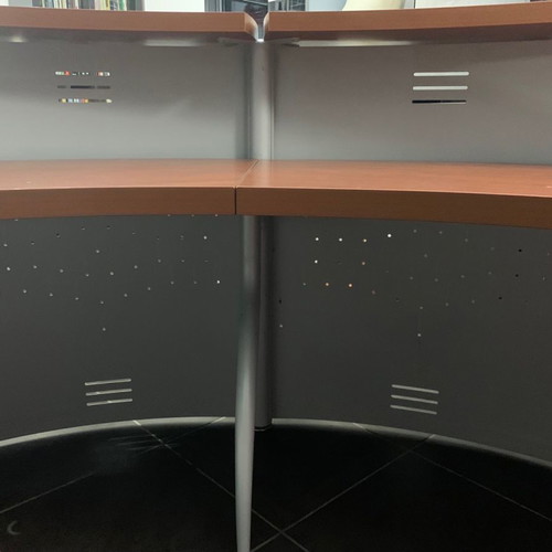 Reception desk used with metal perforated front panel