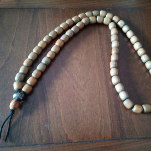 Giant worry beads used, wooden with metal bead
