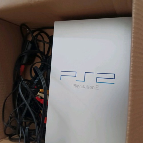 Sony PlayStation 2 used with 4 microphones and 4 games