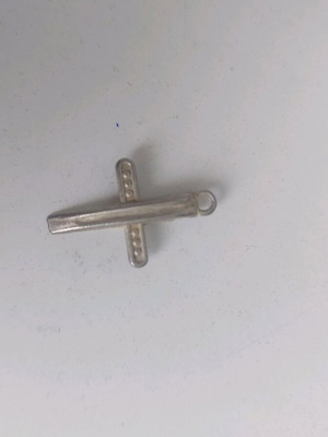 Cross pendant stainless steel used, silver color