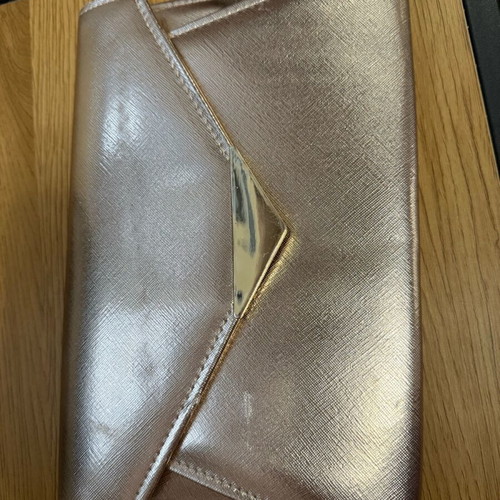 Envelope shoulder bag used pink gold with golden details