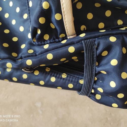 School backpack with pencil case used, polka dot design