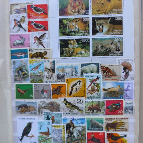 Album A4 16 pages like new with multinational animal stamp collection