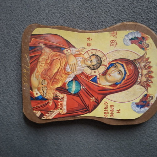 Religious icons used, including saints and Panagia images