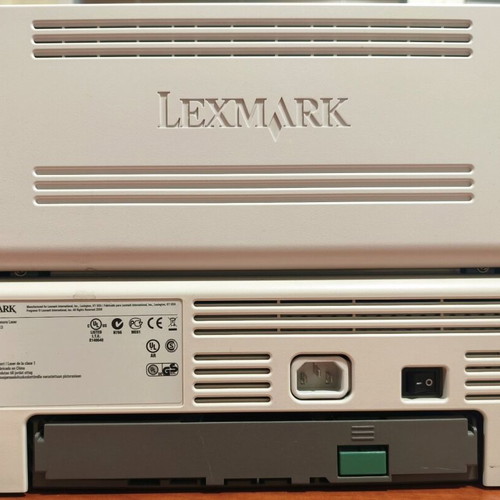 Lexmark E360dn laser printer with paper feed issue, suitable for parts