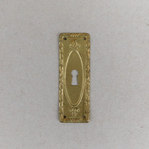 Decorative brass covers for furniture locks