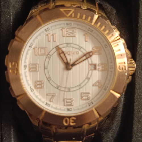 Vogue women's watch like new, gold color