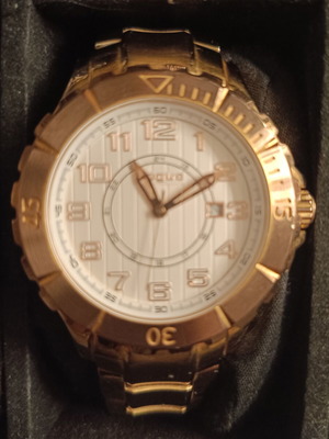 Vogue women's watch like new, gold color