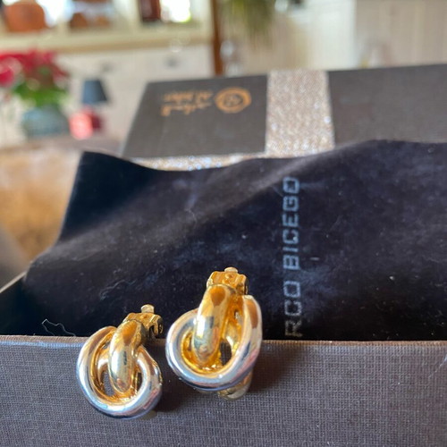 Clip-on earrings like new, silver-gold two-tone knot design